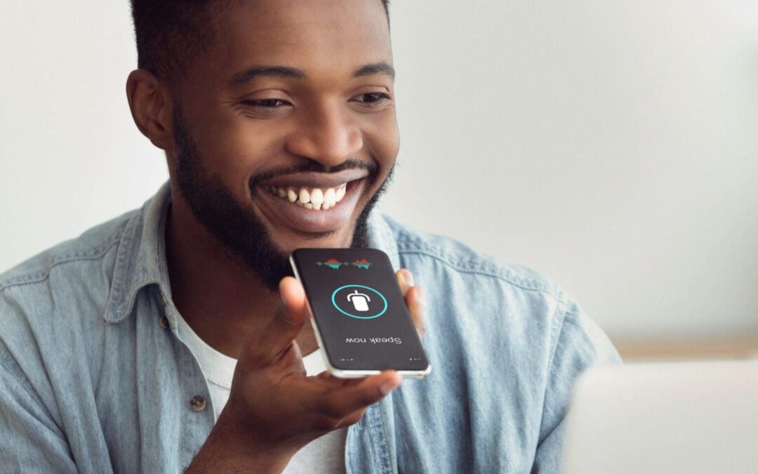 Black guy using smart phone voice assistant sittin utc scaled